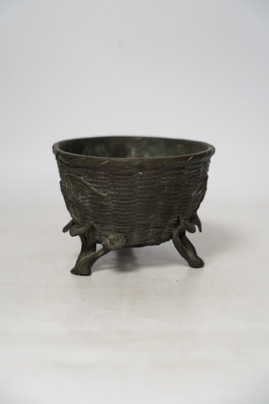 A Japanese bronze tripod censer cast with bats, three character maker’s mark, 12cm in diameter. Condition - fair to good